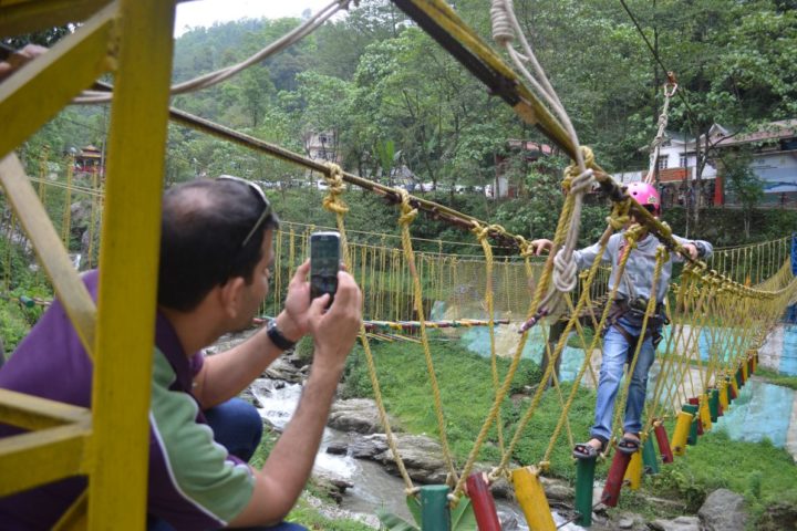 Dad excited seeing his sone complete rope challenge course in Sikkim