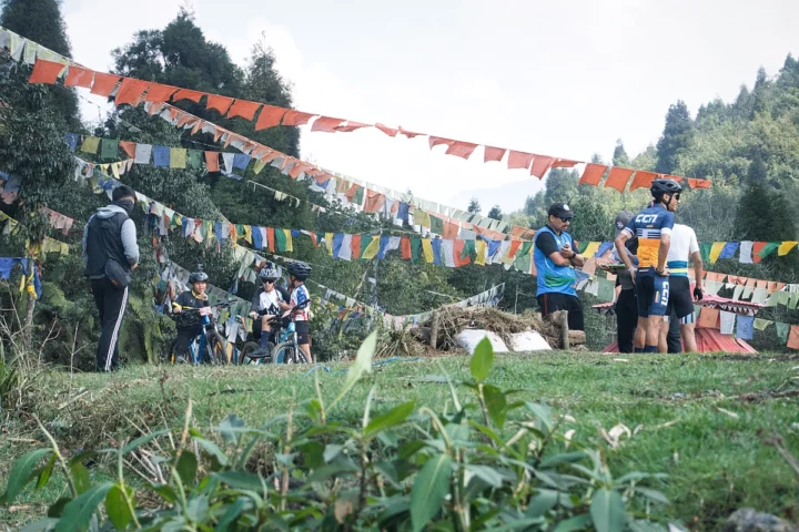A group of cyclists including children and adults gathered for a great mtb trail session