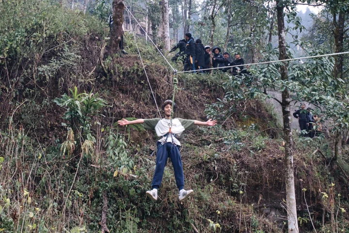 Students of Taktse International School, Sikkim doing zip lining activities as part of their outdoor adventure course with Adventure Zone Sikkim